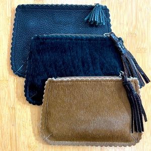 Set of three leather and pony hair pouches